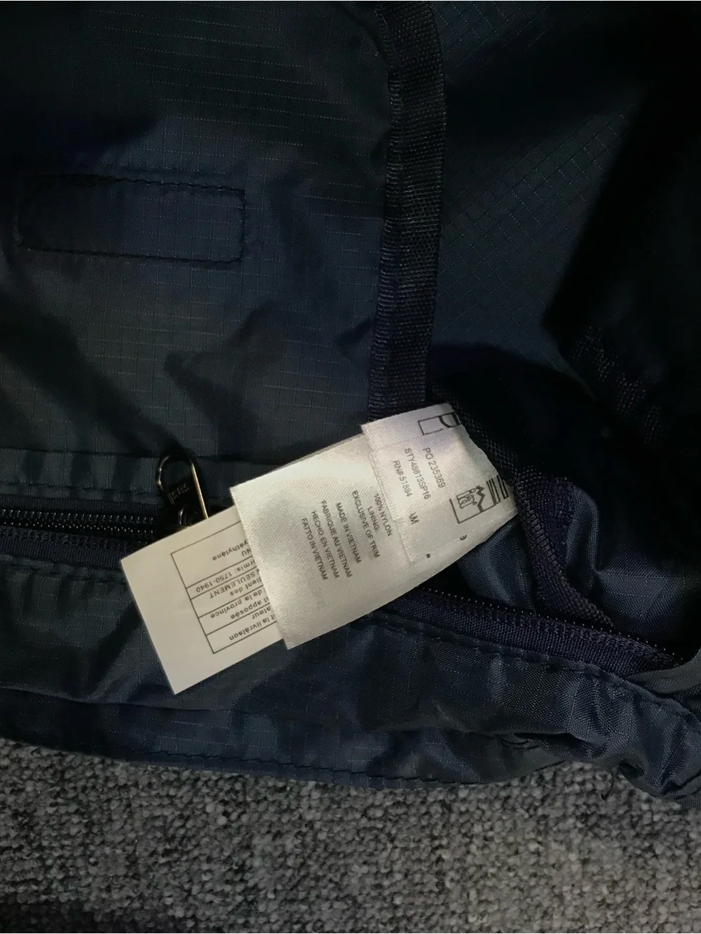 Patagonia Navy Blue Crossbody Travel Bag with Orange Accents